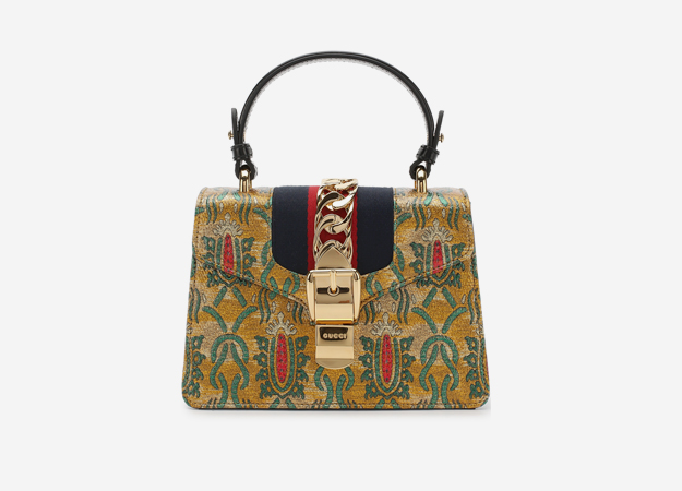 Сумка Gucci<p><a href=\"https://www.tsum.ru/catalog/zhenskie_sumki-2419/sumka_sylvie-5168472-color-zolotoy.html\" target=\"_blank\" style=\"\">Tsum.ru</a></p>